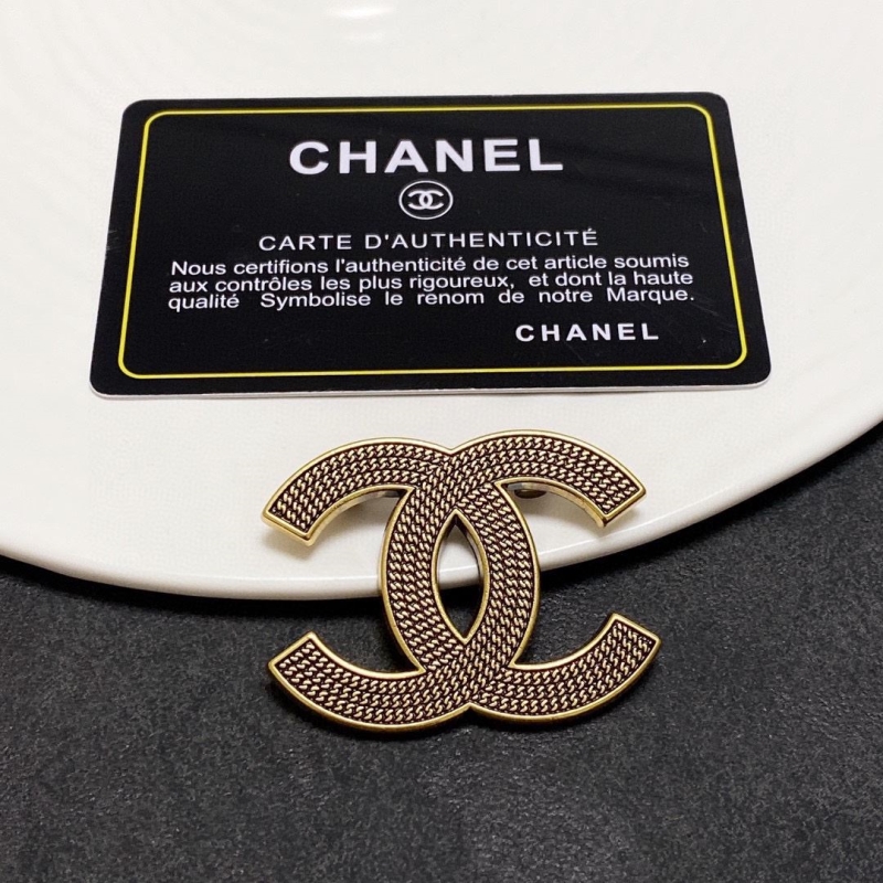 Ch**el brooches